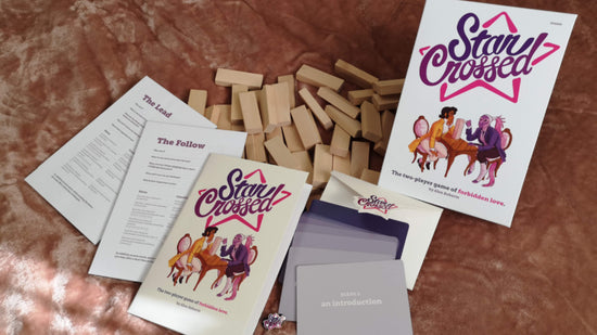 all the components included with the game, and a jenga tower